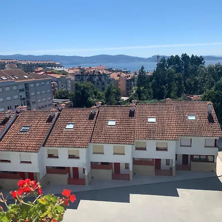 Con Piscina En El Centro De Lägenhet Sanxenxo